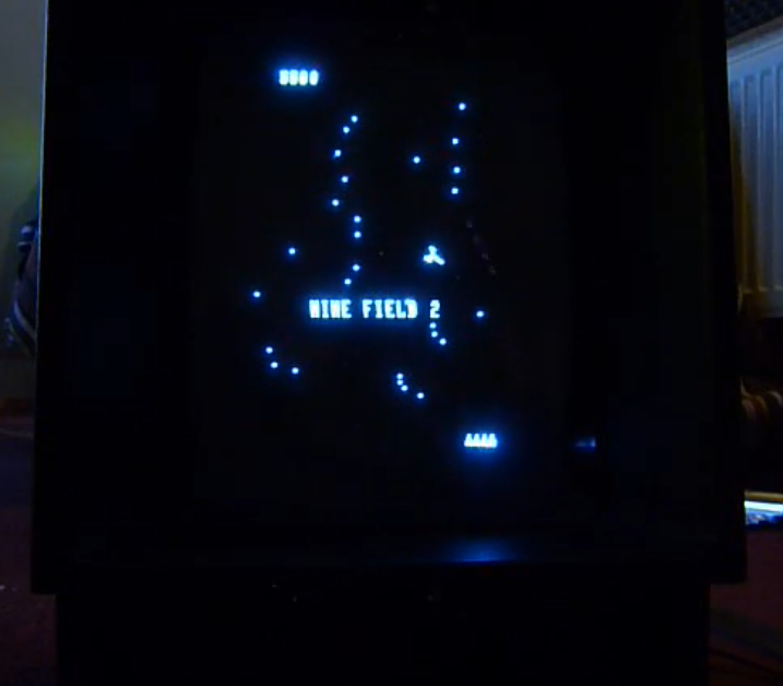 Still frame of Vectrex console running Mine Storm